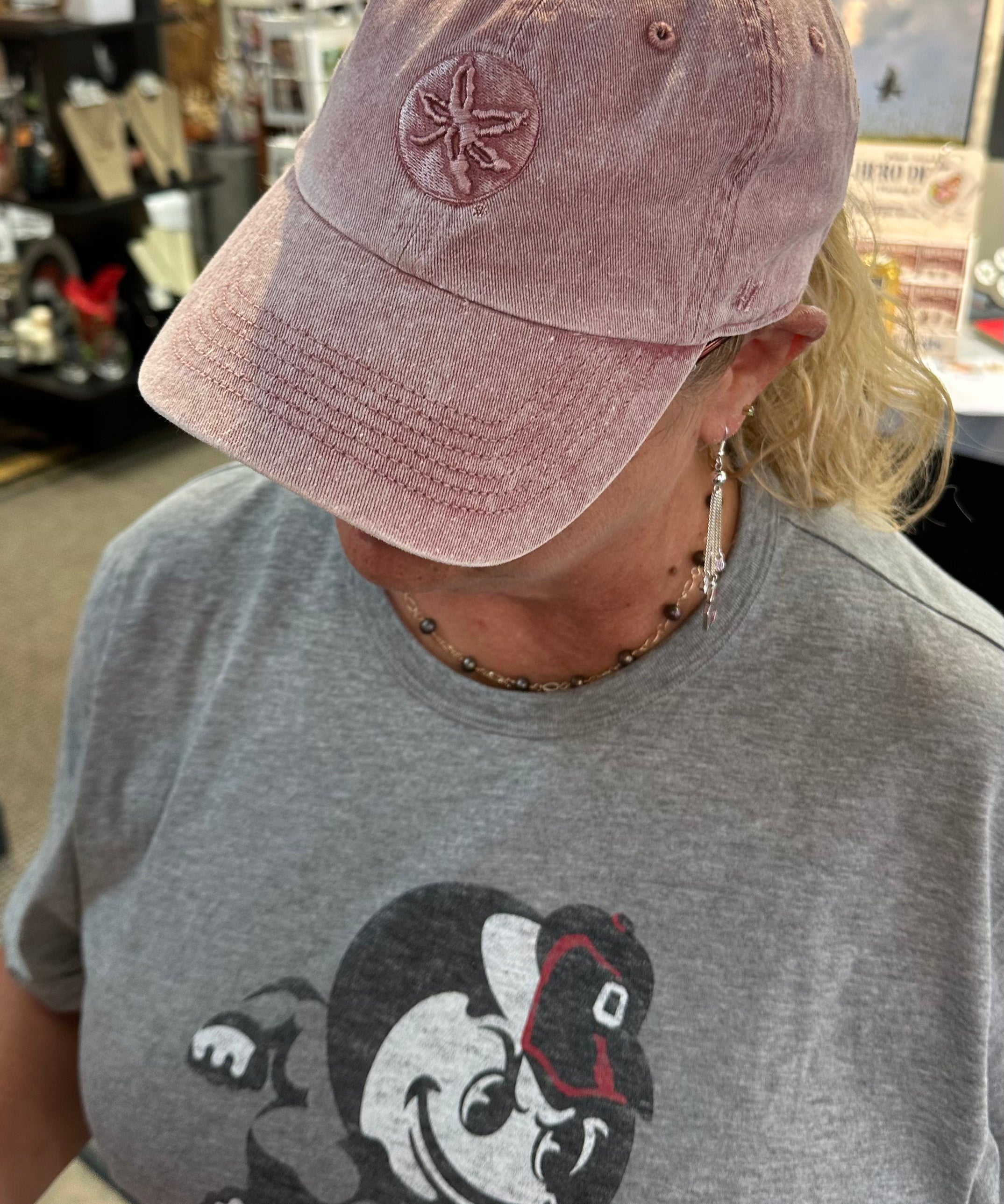 misty hat on staff at store