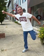 buckeye fan wearing BUCKEYES white shirt outside OSU Sports Fans store
