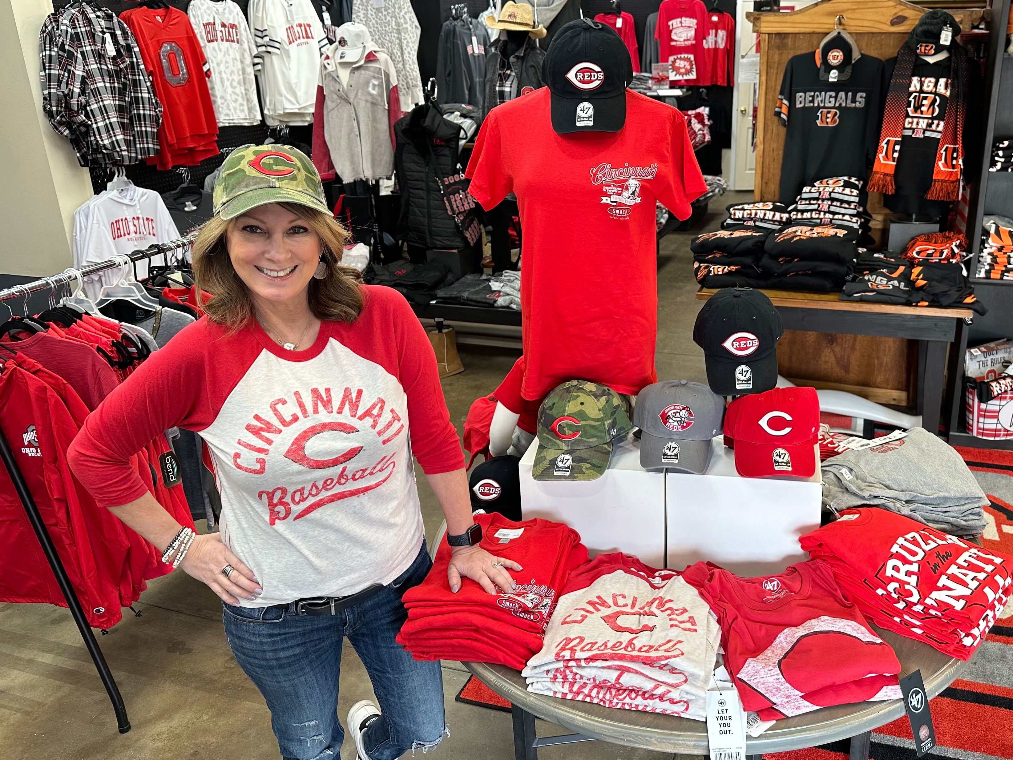 Lynn at store, Cincinnati Reds gear display