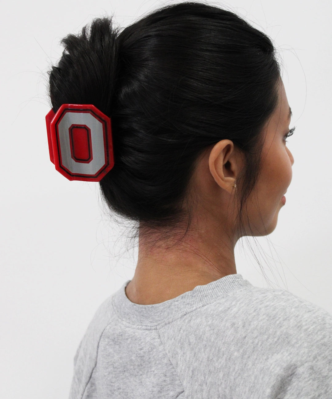 in hair red Ohio State® Block O Statement Claw Clip