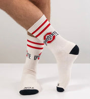 White socks with red stripes and Ohio State logo on a light gray background