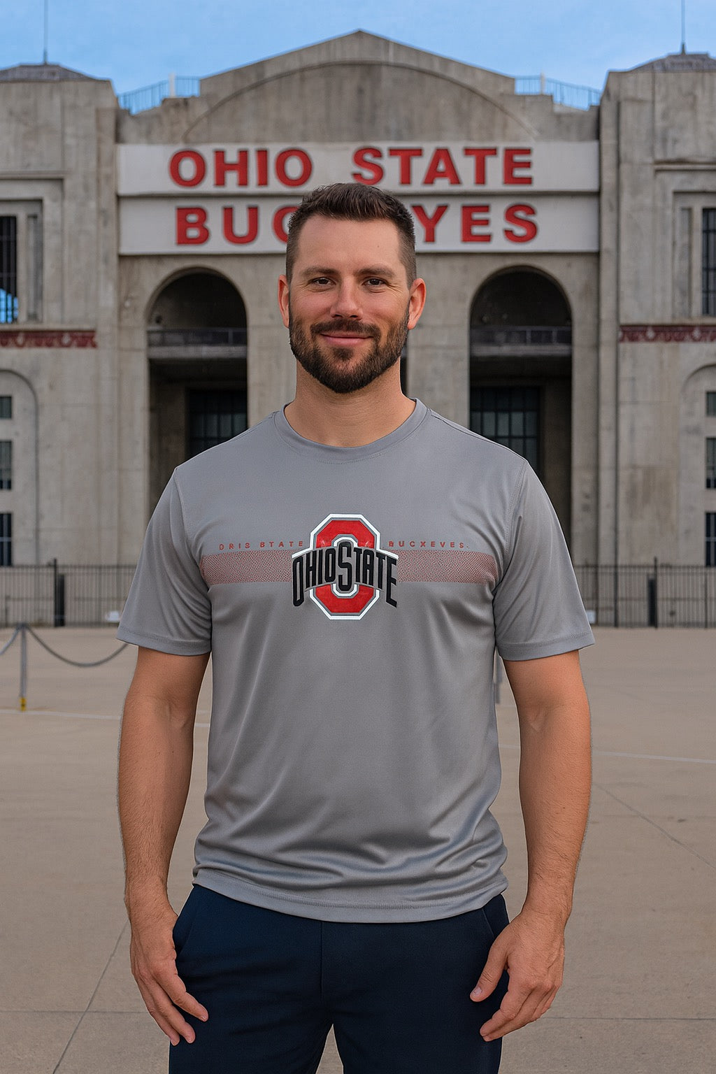 Man wearing an Ohio State t-shirt in front of Ohio Stadium