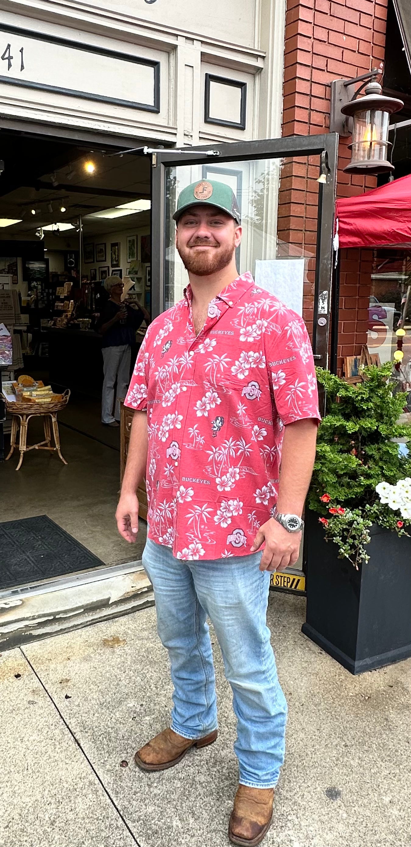 man standing outside store wearing OHIO STATE KEKAI RED HAWAIIAN BUTTON-UP WITH BRUTUS AND LOGO 