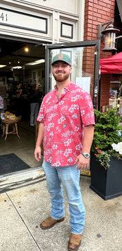 man standing outside store wearing OHIO STATE KEKAI RED HAWAIIAN BUTTON-UP WITH BRUTUS AND LOGO 