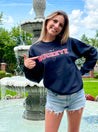 college girl on campus wearing "I'm A Buckeye - Ohio State Crew"
