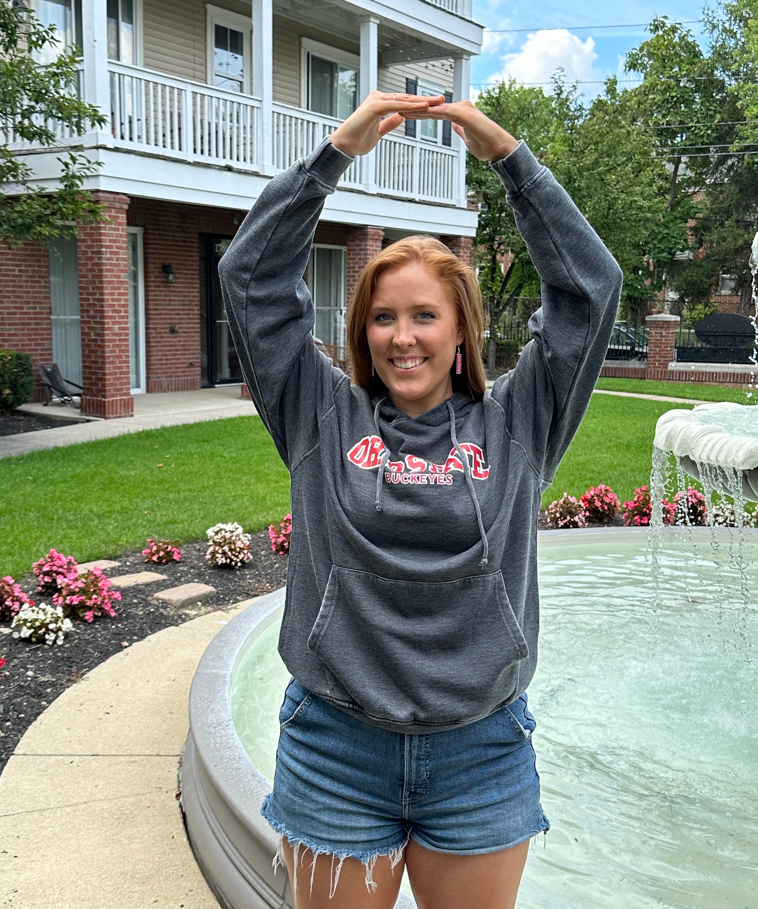 college girl wearing Everybody Hoodie in Charcoal