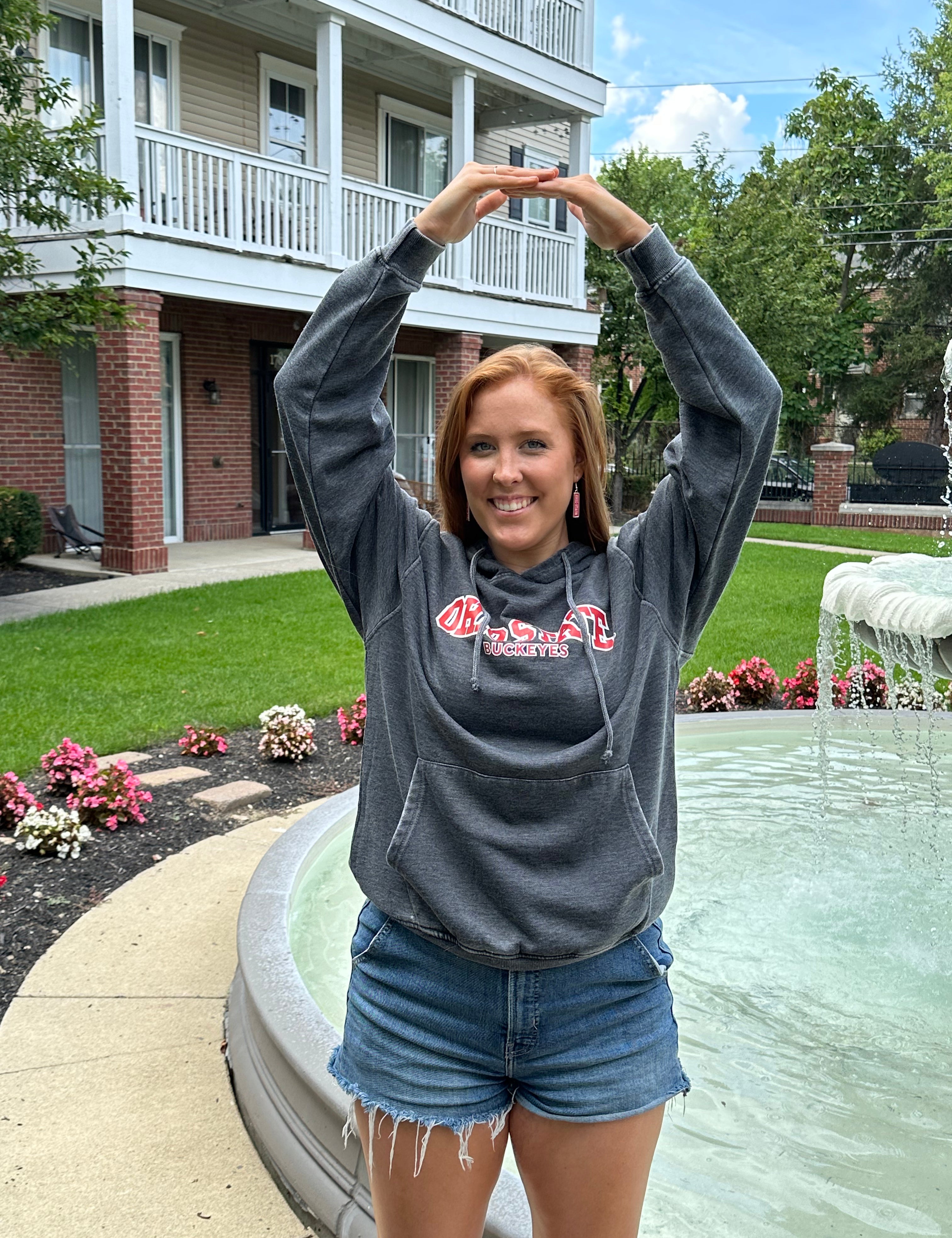 college girl wearing Everybody Hoodie in Charcoal