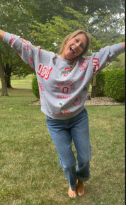 Ohio State Buckeyes sport ash grey crewneck sweatshirt with ribbed cuffs
