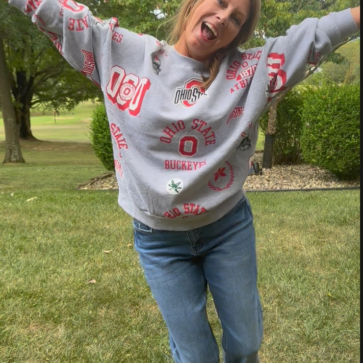 Ohio State Buckeyes sport ash grey crewneck sweatshirt with ribbed cuffs