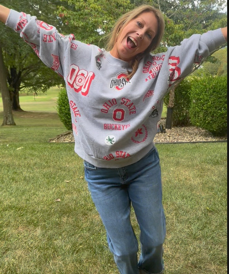 Ohio State Buckeyes sport ash grey crewneck sweatshirt with ribbed cuffs