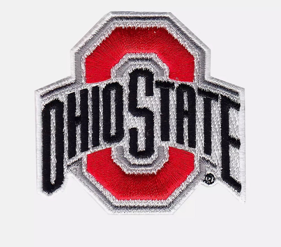 An embroidered Ohio State Buckeyes logo patch on a light gray background. The patch features a red block with black lettering reading 'OHIO STATE' and silver-gray stitched borders.