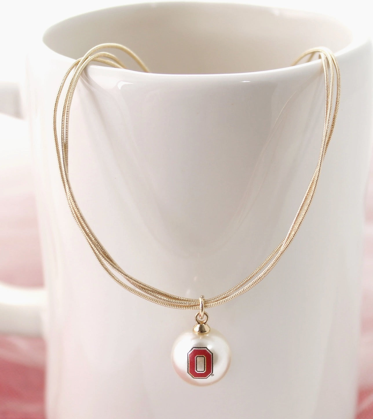 long gold necklace pearl size block O 