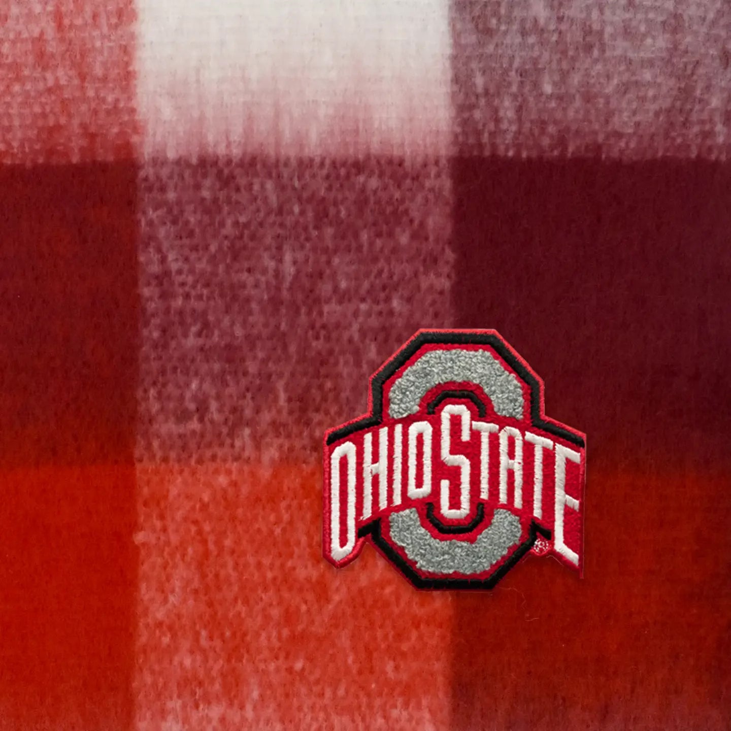Ohio State logo on a red and white checkered fabric background
