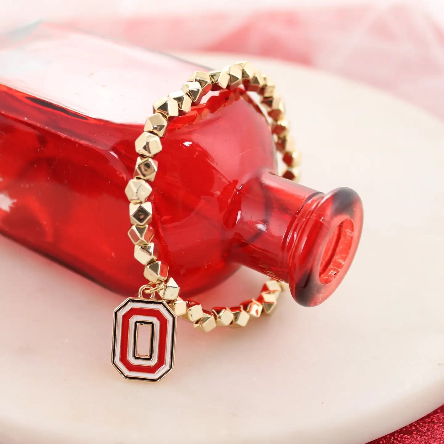 Ohio State gold stretch bracelet with logo charm