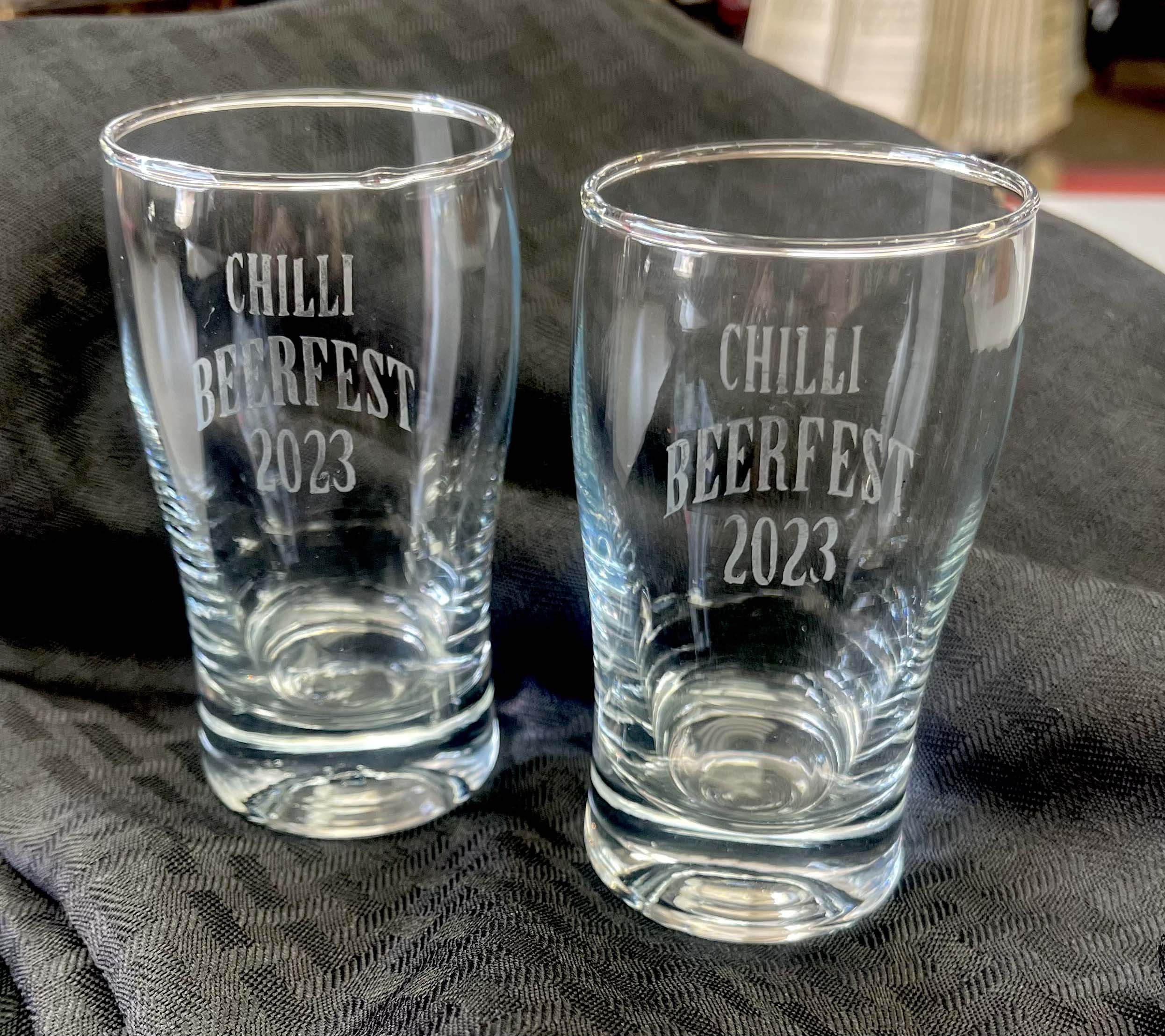 glasses of Chillicothe Brewfest Flight Board with Cork inserts and 4 etched glasses for sampling brews!