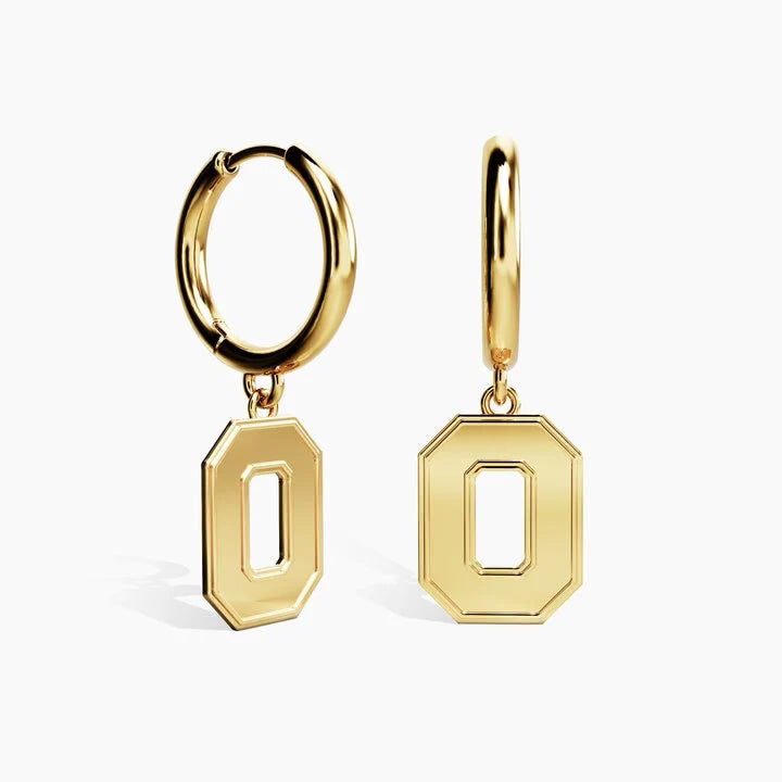 A pair of gold hoop earrings with hanging octagonal letter 'O' charms, displayed on a clean white background.