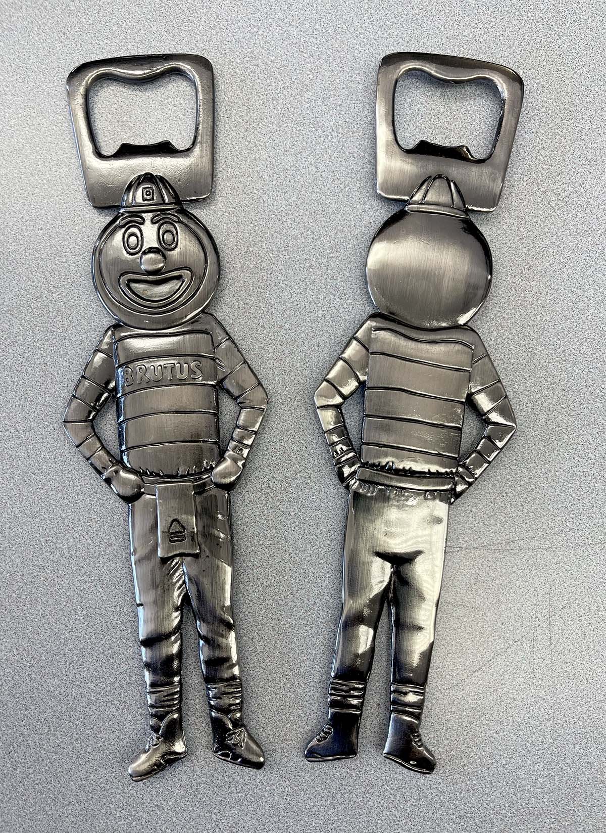 Front and back of BRUTUS PEWTER BOTTLE OPENER